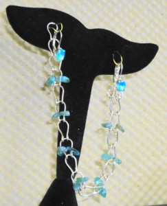 Judy Ellis's Gem Profile- Apatite - , General Education, , Horseshoe link bracelet using Apatite chip beads and sterling silver wire.