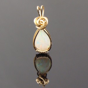 Dale Armstrong's Gem Profile- White Precious Opal - , General Education, , Opal pendant wrapped in gold filled wire