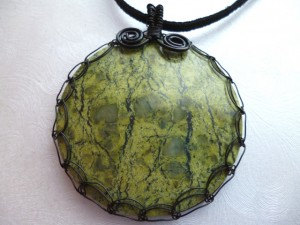 Judy Ellis's Gem Profile- Serpentine - , General Education, , Serpentine pendant with a round cabochon and a Viking Weave Bezel