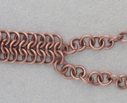 Kylie Jones's Copper Braided Chain Maille Bracelet - , Chain Maille Jewelry, Making Chain, Chain Making , Oxidizing Wire, Oxidizing, Antiquing Wire, Antiquing, Add an end ring from one of the shorter copper chains into the open ring and close the ring.