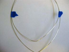 Tracey McKenzie's Lightning Storm - , Contemporary Wire Jewelry, Wire Wrapping, Wrapping, Wire Wrapping Jewelry, Securing both 16-gauge wires together.