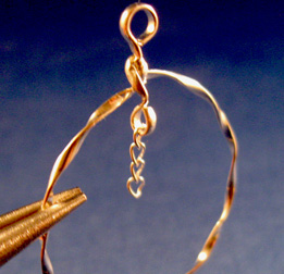 Sherrie Lingerfelt's Twisted Circles Earrings - , Contemporary Wire Jewelry, Wire Wrapping, Wrapping, Wire Wrapping Jewelry, Adding chain to largest hoops.