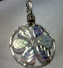 Jill Gentry's Crazy Daisy Pendant - , Contemporary Wire Jewelry, Wire Wrapping, Wrapping, Wire Wrapping Jewelry, Adding petals to the frame.