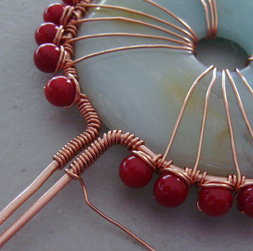 Mary Bailey's Spirit Pendant - , Contemporary Wire Jewelry, Coiling, Coiling Wire, Wire Coiling, Weaving, Wire Weaving, Weaving Wire, Tucking the 26-gauge wire after the frame is wrapped.