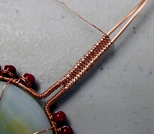 Mary Bailey's Spirit Pendant - , Contemporary Wire Jewelry, Coiling, Coiling Wire, Wire Coiling, Weaving, Wire Weaving, Weaving Wire, 26-gauge wire weaving the two bail wires together.