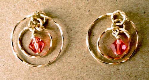 Gene Sheridan's Tri Circle Earrings - , Contemporary Wire Jewelry, Wire Wrapping, Wrapping, Wire Wrapping Jewelry, Adding the larger jump rings, repeating the last step.