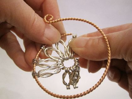 Denny Diamond's Loveknot Pendant - , Contemporary Wire Jewelry, Wire Wrapping, Wrapping, Wire Wrapping Jewelry, Adding knots through the twisted wire.