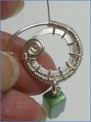 Judy Larson's Snail Trail Spiral Earrings - , Contemporary Wire Jewelry, Wire Wrapping, Wrapping, Wire Wrapping Jewelry, Weaving, Wire Weaving, Weaving Wire, Adding more ring wraps.