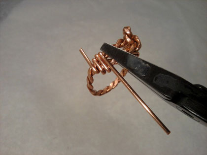 Brenda Sigafoos's Copper Knot Ring - , Contemporary Wire Jewelry, Wire Wrapping, Wrapping, Wire Wrapping Jewelry, Cutting half round wire, and wrapping.