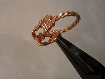 Brenda Sigafoos's Copper Knot Ring - , Contemporary Wire Jewelry, Wire Wrapping, Wrapping, Wire Wrapping Jewelry, Cutting half round wire, and wrapping.