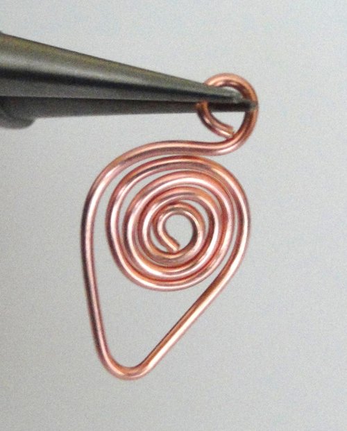 Debora Mauser 's Wire Spiral Earrings - , Contemporary Wire Jewelry, Coiling, Coiling Wire, Wire Coiling, Loops, Wire Loop, Wrapped Wire Loop, Wire Wrapping, Wrapping, Wire Wrapping Jewelry, Finishing the spiral and adding a small loop.