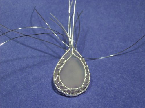 Cynthia Wyatt's Infinity Pendant - , Contemporary Wire Jewelry, Coiling, Coiling Wire, Wire Coiling, Lashing, Wire Lashing, Wire Wrapping, Wrapping, Wire Wrapping Jewelry, Wrapping 20 gauge round wire and 22 gauge half round.