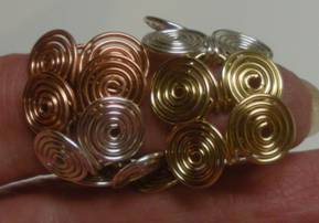 Judy Larson's Coiled Wire Jewelry Series Part 2 - Egyptian Coil Bracelet - , Contemporary Wire Jewelry, Coiling, Coiling Wire, Wire Coiling, Loops, Wire Loop, Wrapped Wire Loop, Spirals, Wire Spiral, Spiral Wire Wrap, Wire Wrapping, Wrapping, Wire Wrapping Jewelry, Flexible Egyptian chain